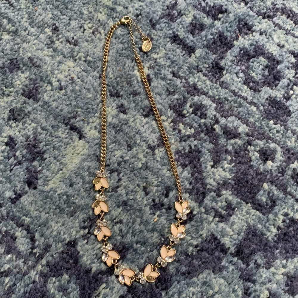 Claire’s 16-17” gold w crystals in flower shapes necklace